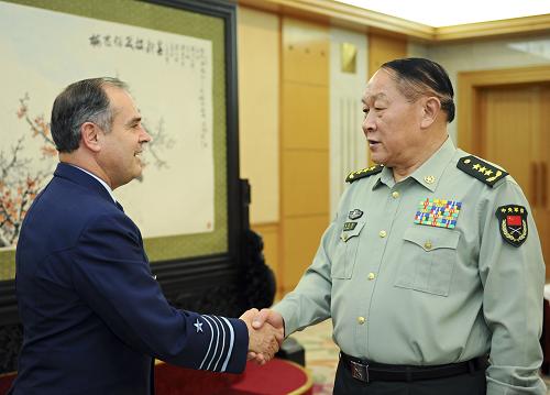 国防部长会见中国国防部长，深化两国军事合作，共谋和平发展，国防部长会见中方同仁深化军事合作，共促和平发展之路